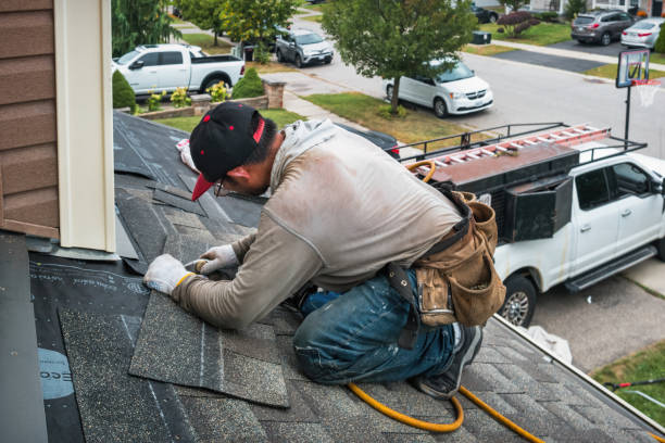 Professional Roofing technician working in South Browning, MT